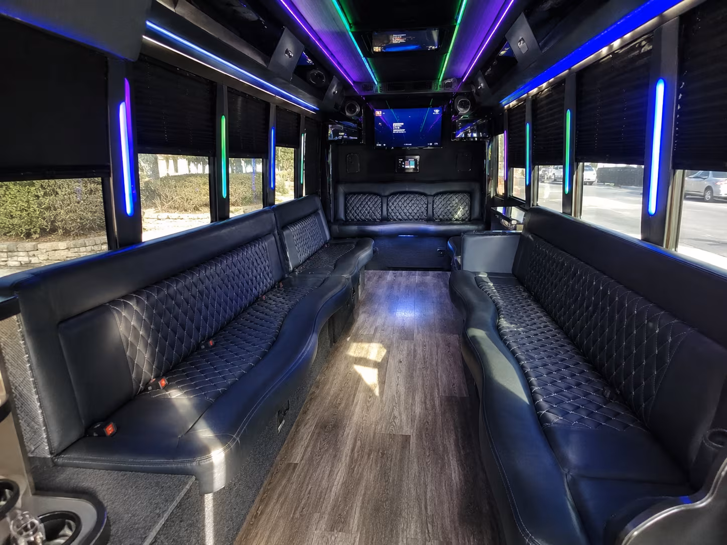 Group beside a Mercedes Sprinter limo in Sparks
